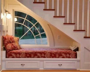 Decorated in red under stairs nook idea