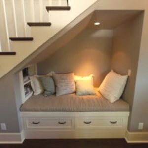 Creative under stairs reading nook